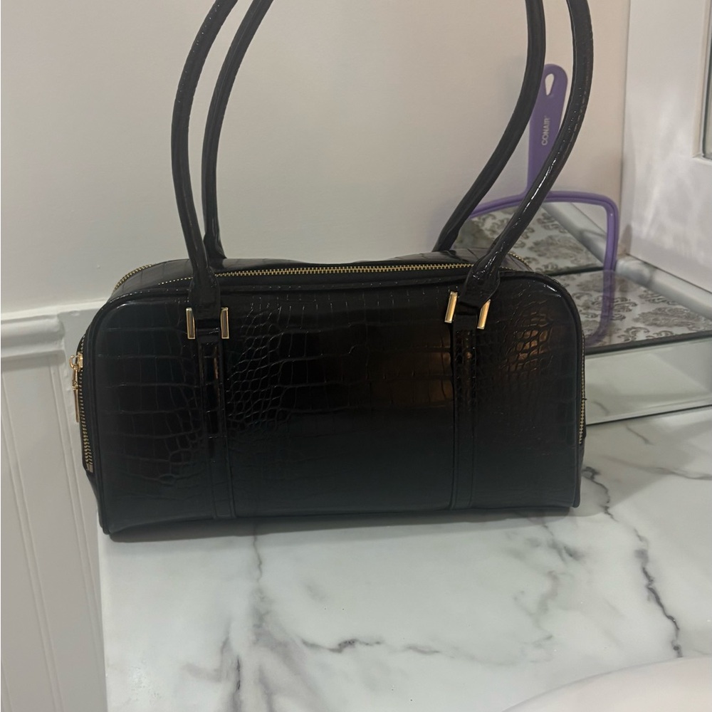Purse like new. Not leather. Is like new